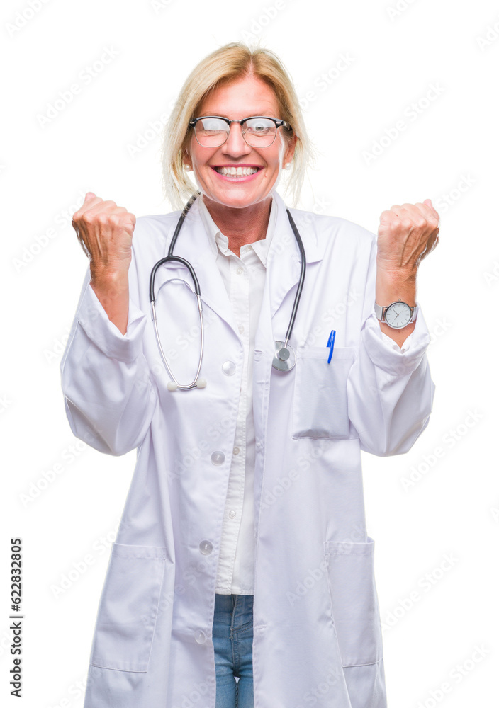 Middle age blonde doctor woman over isolated background celebrating surprised and amazed for success with arms raised and open eyes. Winner concept. Middle age blonde doctor woman over isolated background celebrating surprised and amazed for success with arms raised and open eyes. Winner concept.