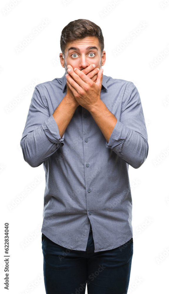 Young handsome man over isolated background shocked covering mouth with hands for mistake. Secret concept. Young handsome man over isolated background shocked covering mouth with hands for mistake. Secret concept.