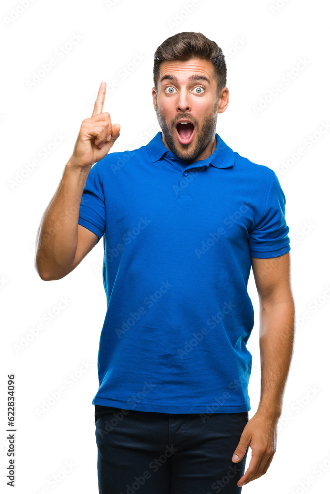 Young handsome man over isolated background pointing finger up with successful idea. Exited and happy. Number one. Young handsome man over isolated background pointing finger up with successful idea. Exited and happy. Number one.