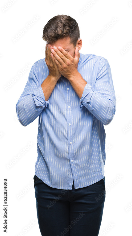 Young handsome man over isolated background with sad expression covering face with hands while crying. Depression concept. Young handsome man over isolated background with sad expression covering face with hands while crying. Depression concept.