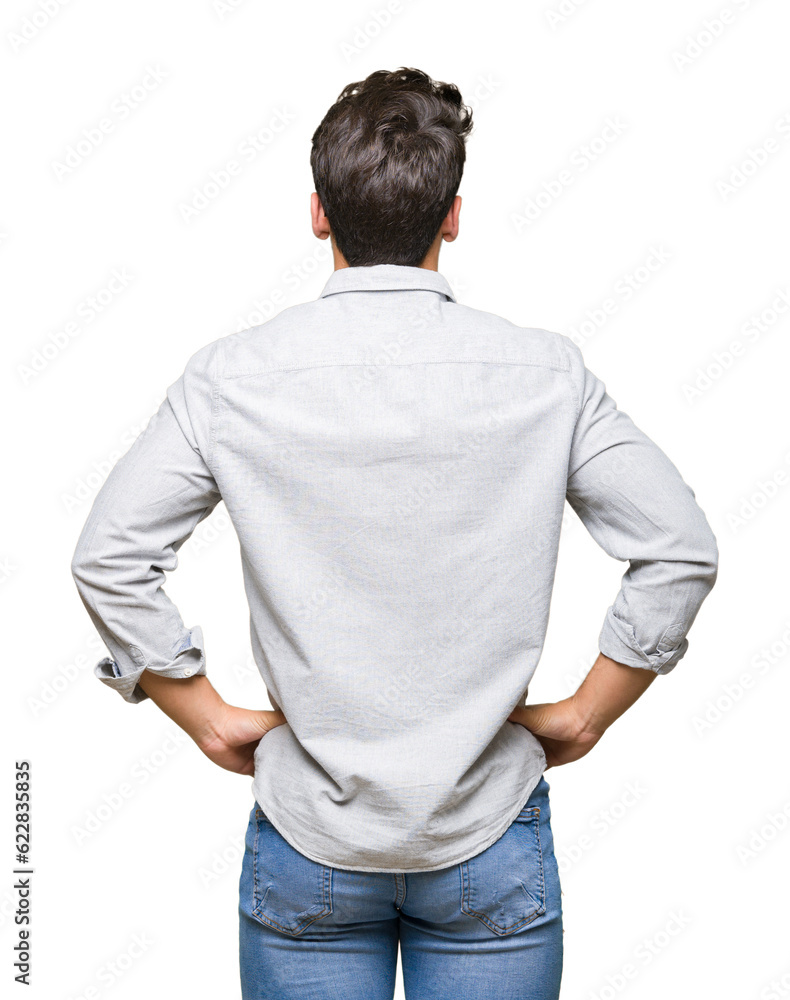Young handsome man wearing glasses over isolated background standing backwards looking away with arms on body Young handsome man wearing glasses over isolated background standing backwards looking away with arms on body