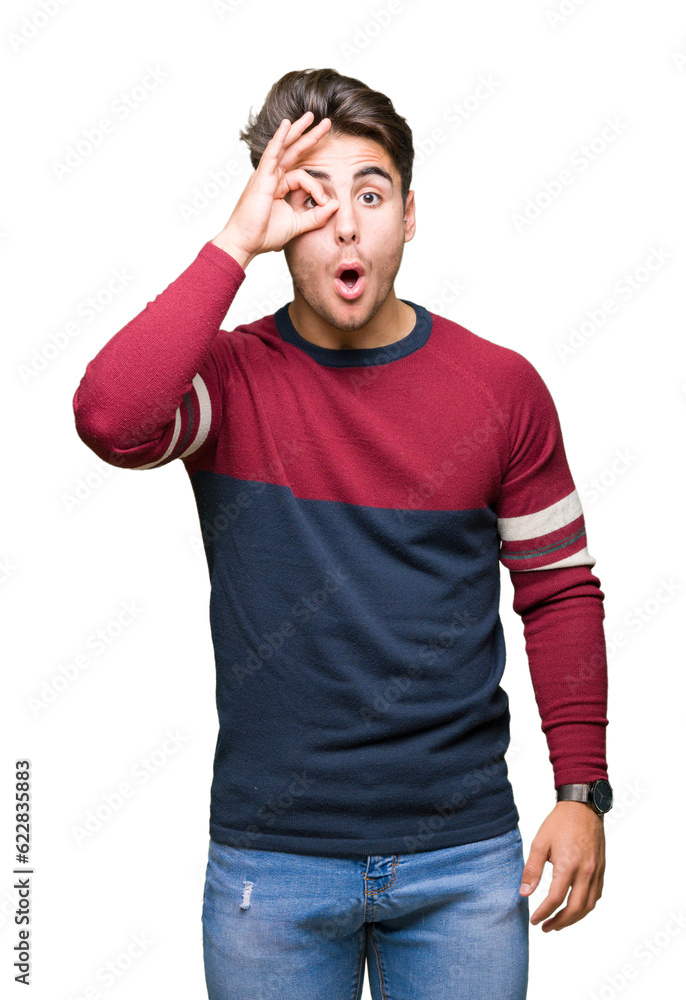 Young handsome man over isolated background doing ok gesture shocked with surprised face, eye looking through fingers. Unbelieving expression. Young handsome man over isolated background doing ok gesture shocked with surprised face, eye looking through fingers. Unbelieving expression.