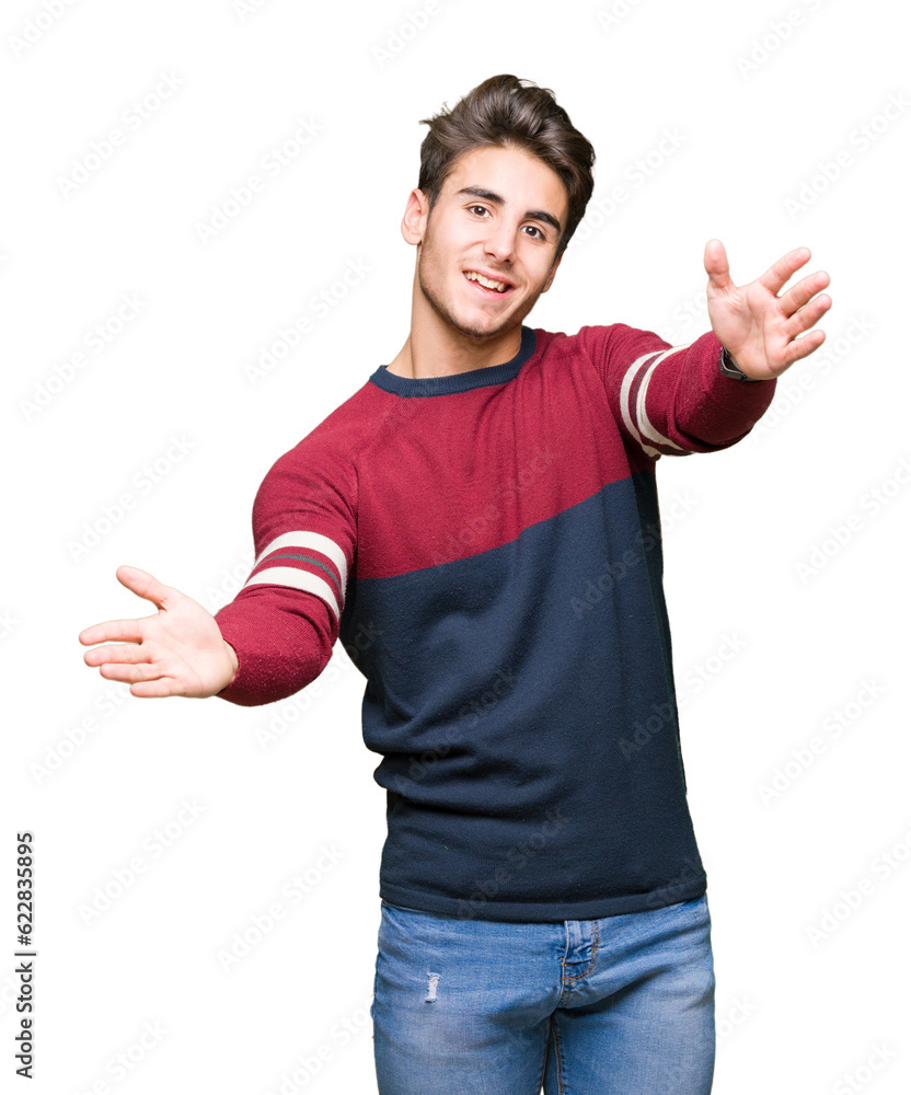 Young handsome man over isolated background looking at the camera smiling with open arms for hug. Cheerful expression embracing happiness. Young handsome man over isolated background looking at the camera smiling with open arms for hug. Cheerful expression embracing happiness.