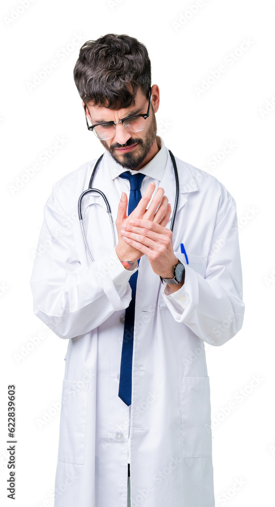 Young doctor man wearing hospital coat over isolated background Suffering pain on hands and fingers, arthritis inflammation Young doctor man wearing hospital coat over isolated background Suffering pain on hands and fingers, arthritis inflammation