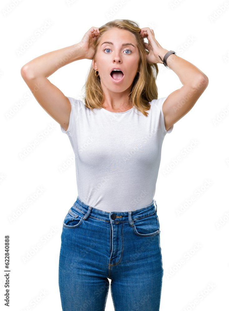 Beautiful young woman wearing casual white t-shirt over isolated background Crazy and scared with hands on head, afraid and surprised of shock with open mouth Beautiful young woman wearing casual white t-shirt over isolated background Crazy and scared with hands on head, afraid and surprised of shock with open mouth