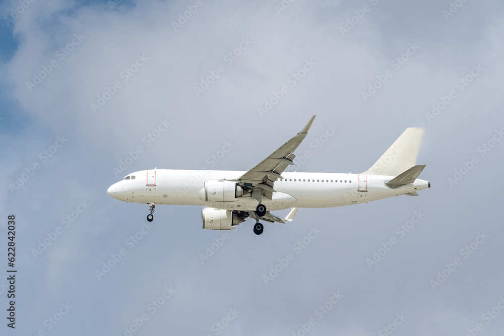 White passenger plane taking off White passenger plane taking off