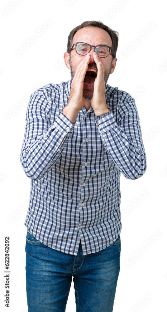 Handsome middle age elegant senior man wearing glasses over isolated background Shouting angry out loud with hands over mouth Handsome middle age elegant senior man wearing glasses over isolated background Shouting angry out loud with hands over mouth