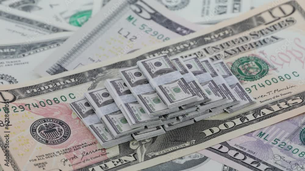 Bundle of America bills, spinning dollars, USD Bundle of America bills, spinning dollars, USD
