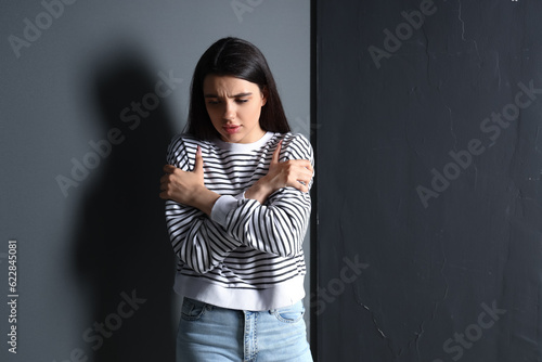 Young woman having panic at...