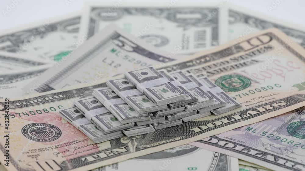 Bundle of America bills, spinning dollars, USD Bundle of America bills, spinning dollars, USD