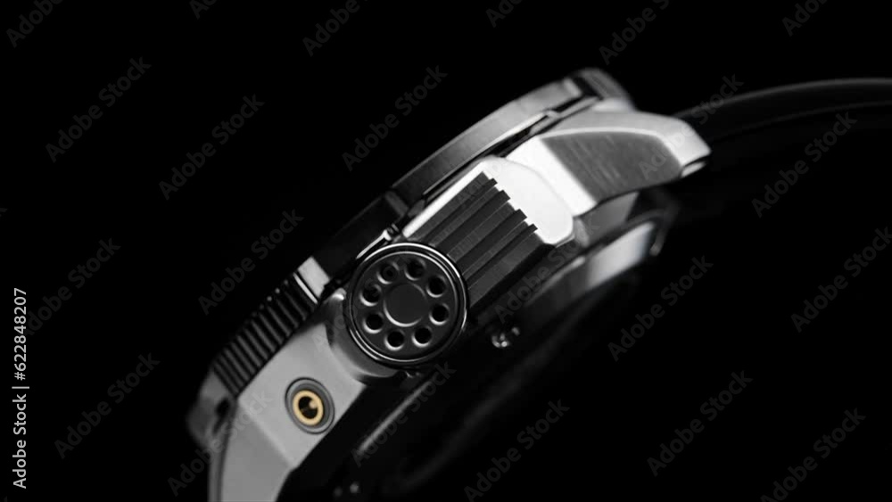 Extreme closeup second arrow passing by on clock face. Closeup real time shot. Running second arrow. Close up macro watch bracelet clasp. Bezel. Closeup view of rotating luxury sports watch. Extreme closeup second arrow passing by on clock face. Closeup real time shot. Running second arrow. Close up macro watch bracelet clasp. Bezel. Closeup view of rotating luxury sports watch.
