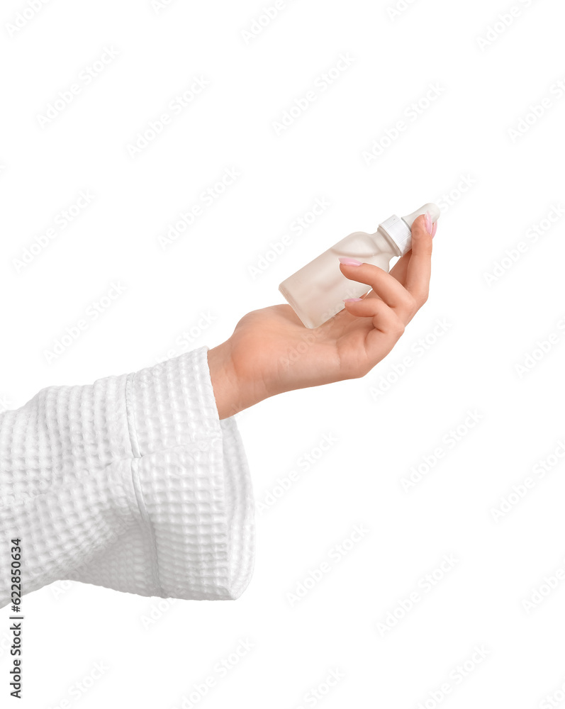 Φωτογραφία Hand of woman with bottle of cosmetic oil on white background