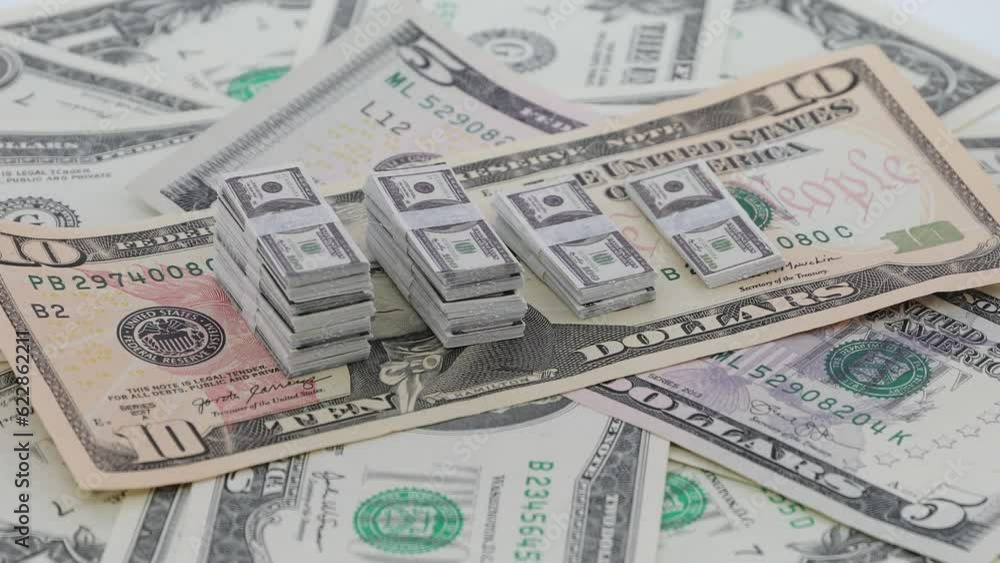 Bundle of America bills, spinning dollars, USD Bundle of America bills, spinning dollars, USD