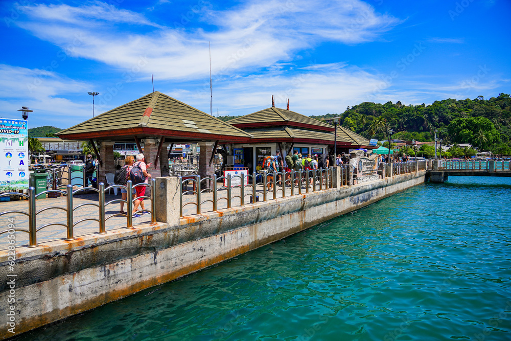 Koh Phi Phi, Thailand - February 8, 2023 : Tourists arriving on Koh Phi Phi island though Ton Sai Pier, Krabi Province, Thailand