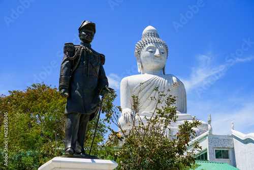 The Great Buddha of Phuket aka Ming Mongkol Buddha, is a seated Maravijaya Buddha statue made of concrete and covered in white Burmese marble tiles. It sits on top of a hill on Phuket island, Thailand photo