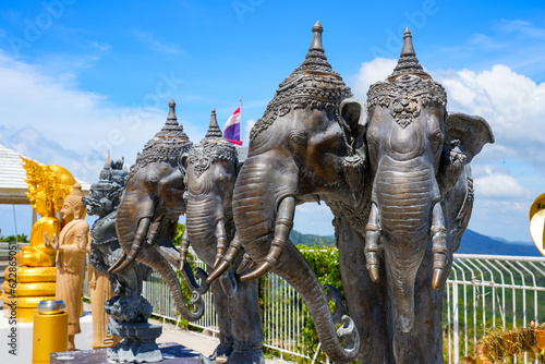Elephant statues on the hilltop platform of the Great Buddha of Phuket overlooking Phuket island in Thailand photo