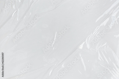 Transparant wrinkled plastic, white plastic or polyethylene bag texture, macro, white background