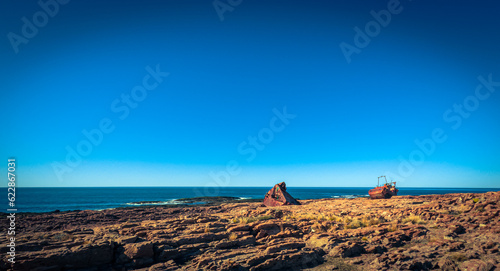 Ship stranded and broken on the coast