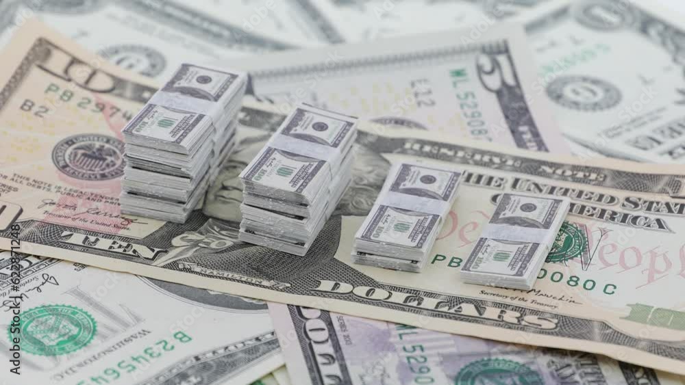Bundle of America bills, spinning dollars, USD Bundle of America bills, spinning dollars, USD