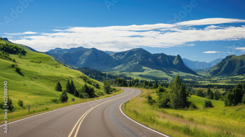 Country road and green mountains in summer