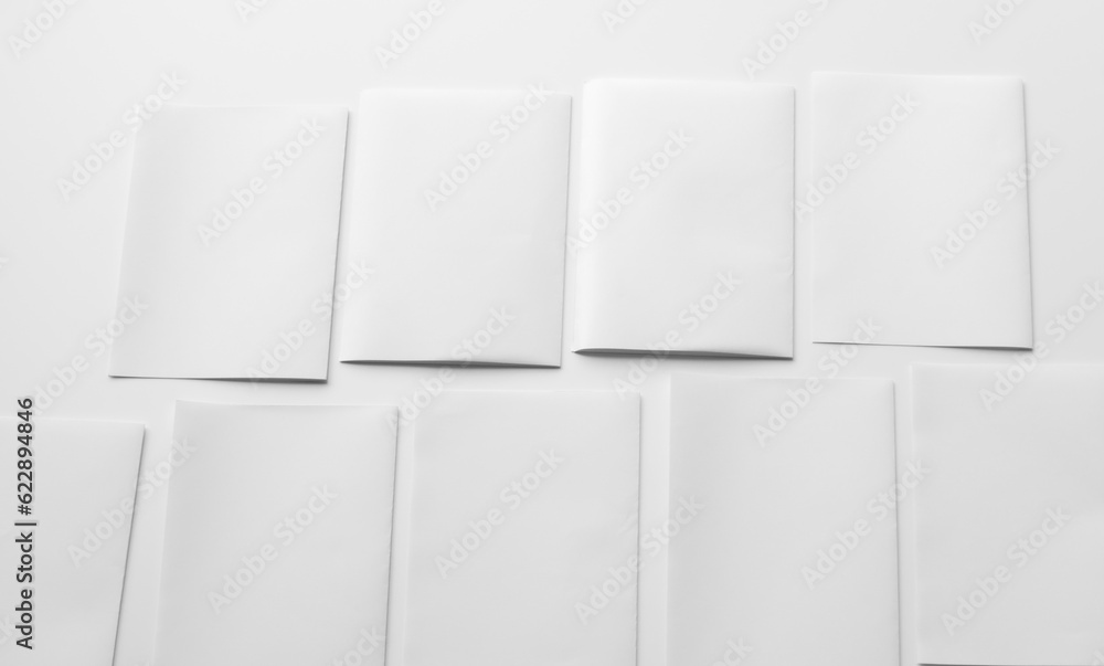 White paper mock-ups isolated on white background, Blank portrait paper A4. brochure newspaper magazine, can use poster banners products business texture for your. White paper mock-ups isolated on white background, Blank portrait paper A4. brochure newspaper magazine, can use poster banners products business texture for your.
