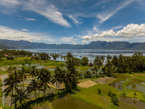 Rice fields and farmland in the highlands next to the lake Maninjau. Sumatra, Indonesia. photo