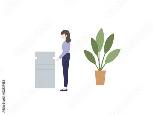 コピーをする女性と観葉植物