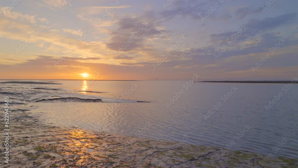 Slow pan across sunset coastline in slow motion at Fleetwood, Wyre, Lancashire, England, UK Slow pan across sunset coastline in slow motion at Fleetwood, Wyre, Lancashire, England, UK