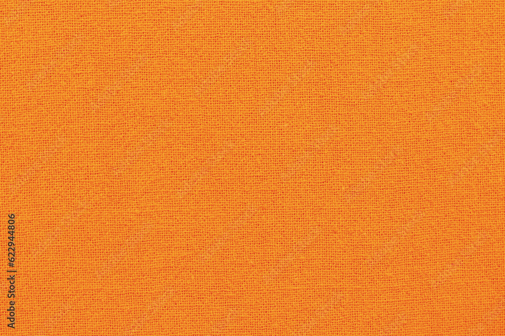 Fototapeta premium Orange cotton fabric cloth texture for background, natural textile pattern.