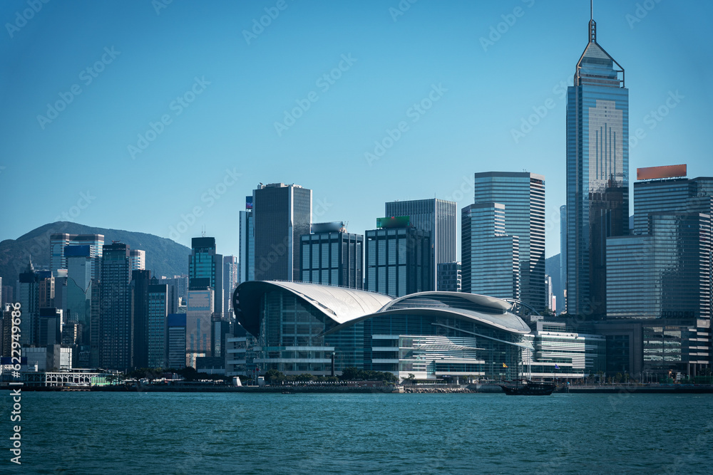 Naklejka premium Cityscape and skyline at Victoria Harbour in Hong Kong city