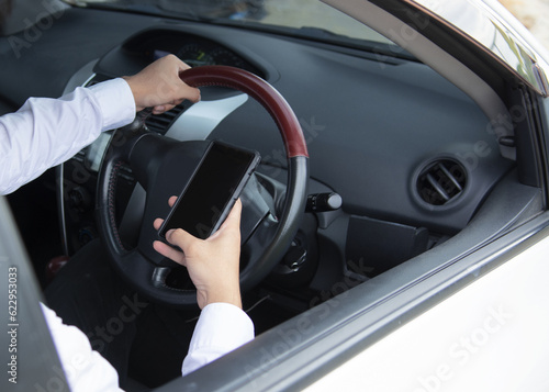 Man driving and should not used smartphone   safety concept
