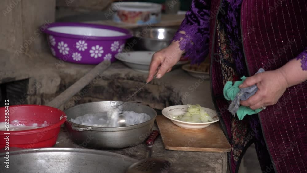 a woman mixing the cream milk a woman mixing the cream milk