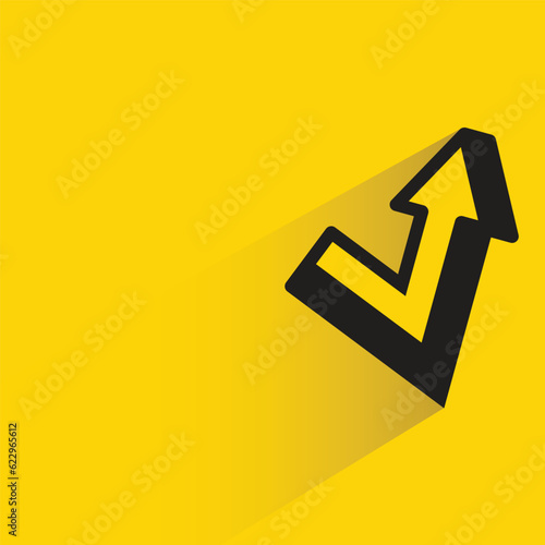 turn up arrow with shadow on yellow background