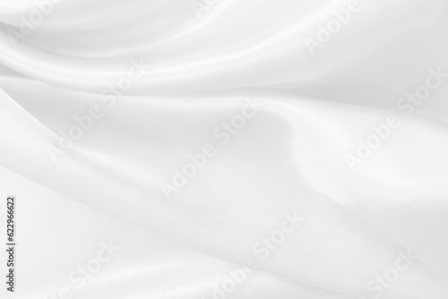 White fabric texture for background and design, beautiful pattern of silk or linen. © Nattha99