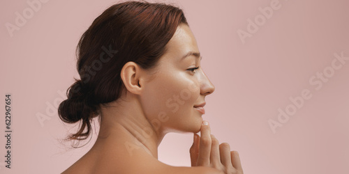 Skin Care and Beauty Concept Photo of Woman with Clean and Healthy Skin Touching Her Face