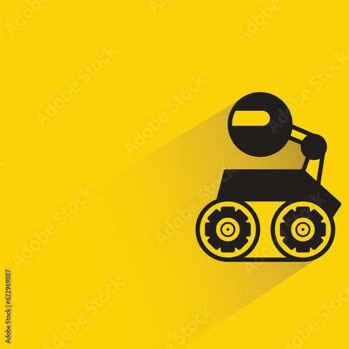 cute robot with shadow on yellow background