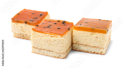 Pieces of cheesecake with jelly on white background