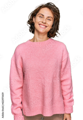 Young hispanic woman wearing casual clothes with a happy and cool smile on face. lucky person.