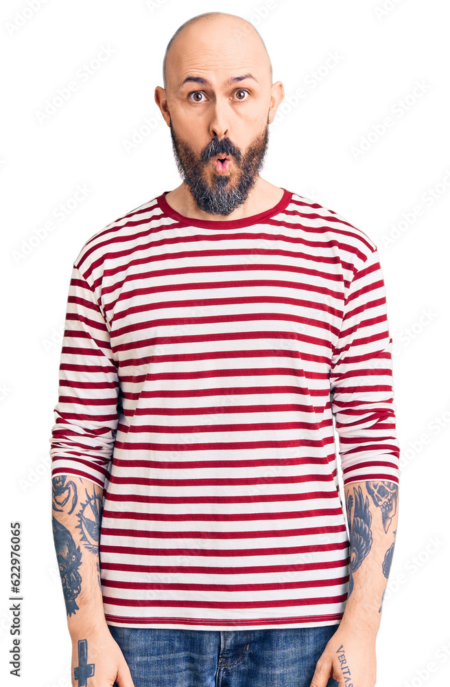 Young handsome man wearing casual clothes afraid and shocked with surprise expression, fear and excited face. Young handsome man wearing casual clothes afraid and shocked with surprise expression, fear and excited face.
