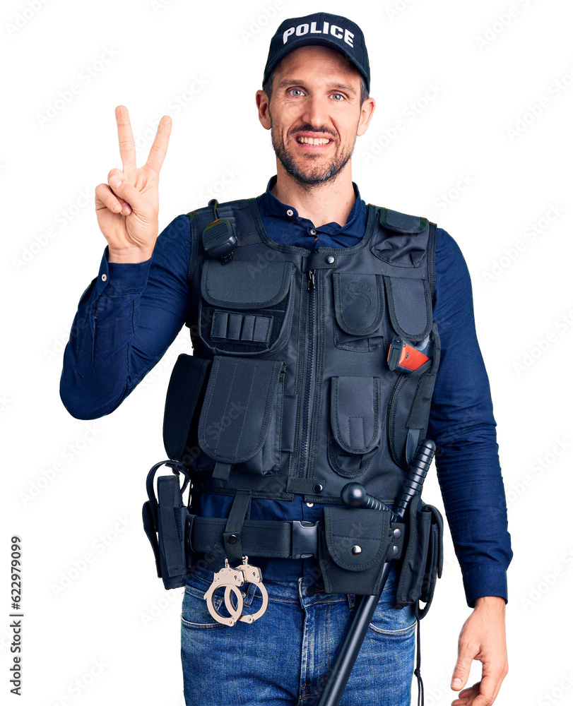 Young handsome man wearing police uniform showing and pointing up with fingers number two while smiling confident and happy. Young handsome man wearing police uniform showing and pointing up with fingers number two while smiling confident and happy.