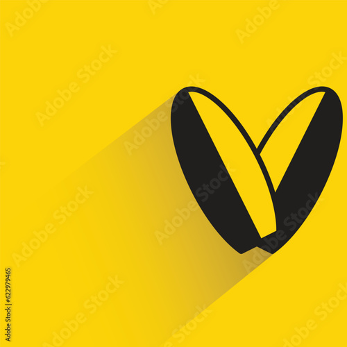 surfboard with shadow on yellow background