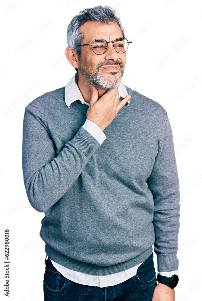 Middle age hispanic with grey hair wearing glasses touching painful neck, sore throat for flu, clod and infection Middle age hispanic with grey hair wearing glasses touching painful neck, sore throat for flu, clod and infection