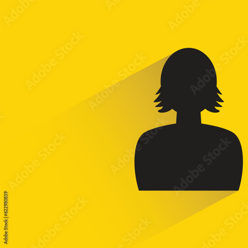 silhouette woman with shadow on yellow background