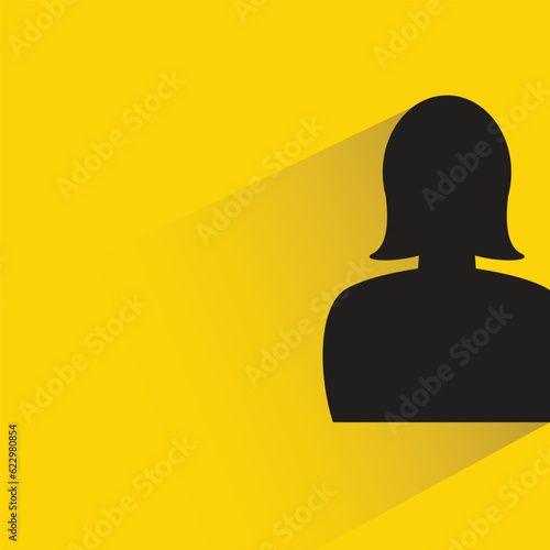 silhouette woman with shadow on yellow background