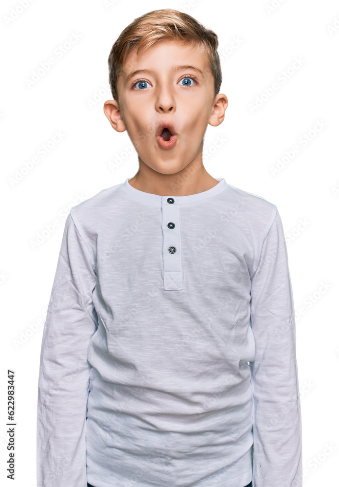 Little caucasian boy kid wearing casual clothes afraid and shocked with surprise expression, fear and excited face. Little caucasian boy kid wearing casual clothes afraid and shocked with surprise expression, fear and excited face.