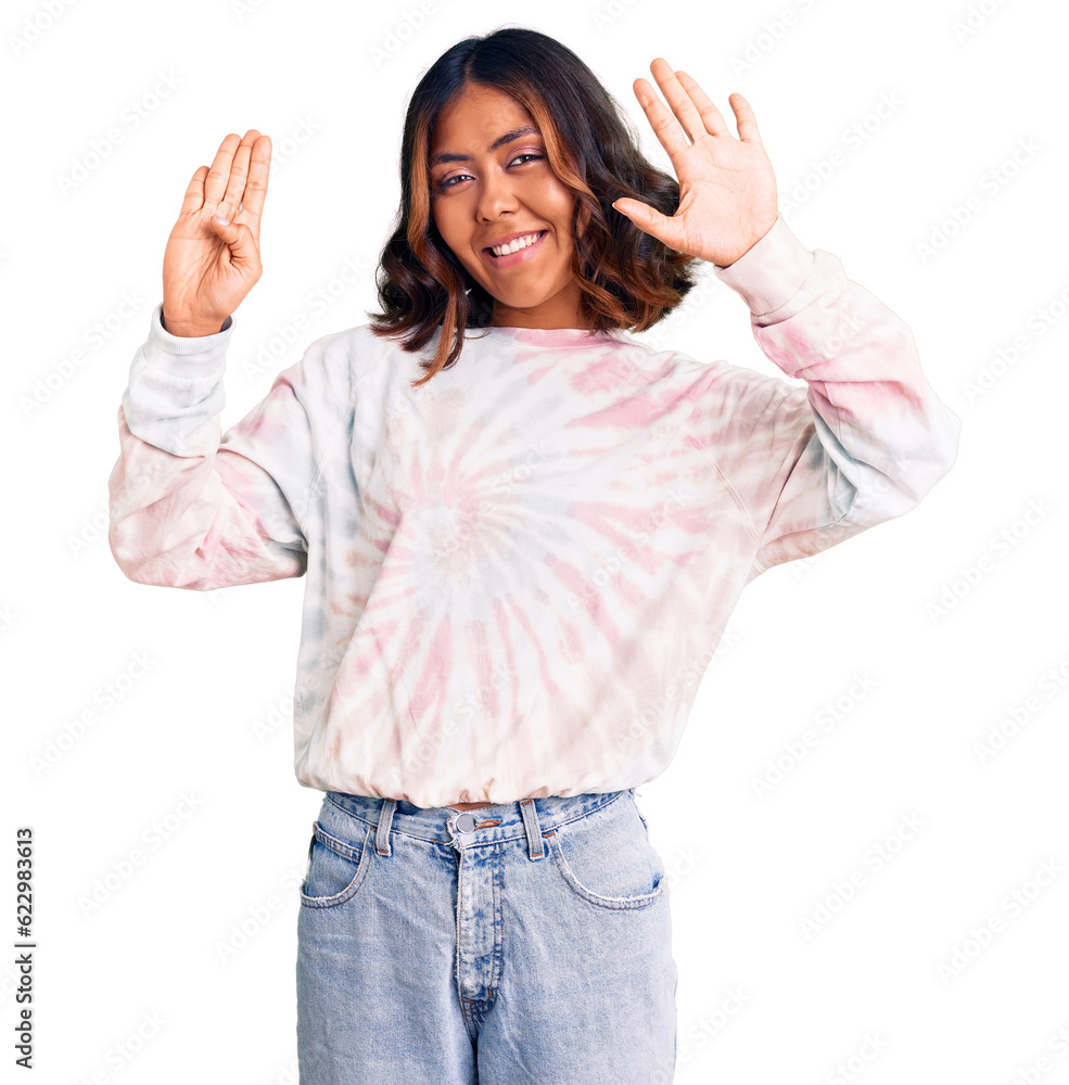 Young beautiful mixed race woman wearing casual tie dye sweatshirt showing and pointing up with fingers number nine while smiling confident and happy. Young beautiful mixed race woman wearing casual tie dye sweatshirt showing and pointing up with fingers number nine while smiling confident and happy.