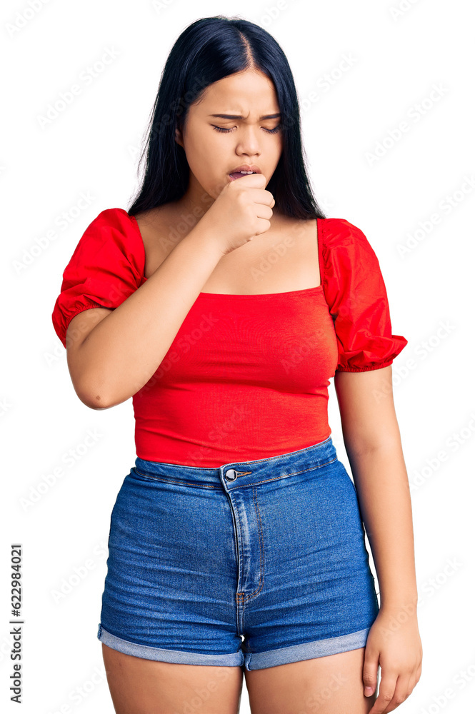 Young beautiful asian girl wearing casual clothes feeling unwell and coughing as symptom for cold or bronchitis. health care concept. Young beautiful asian girl wearing casual clothes feeling unwell and coughing as symptom for cold or bronchitis. health care concept.