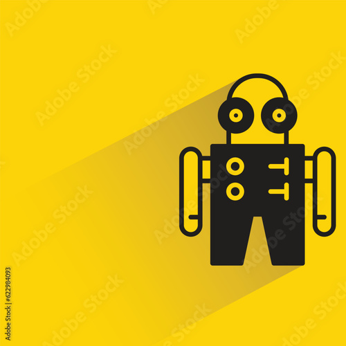robot with shadow on yellow background