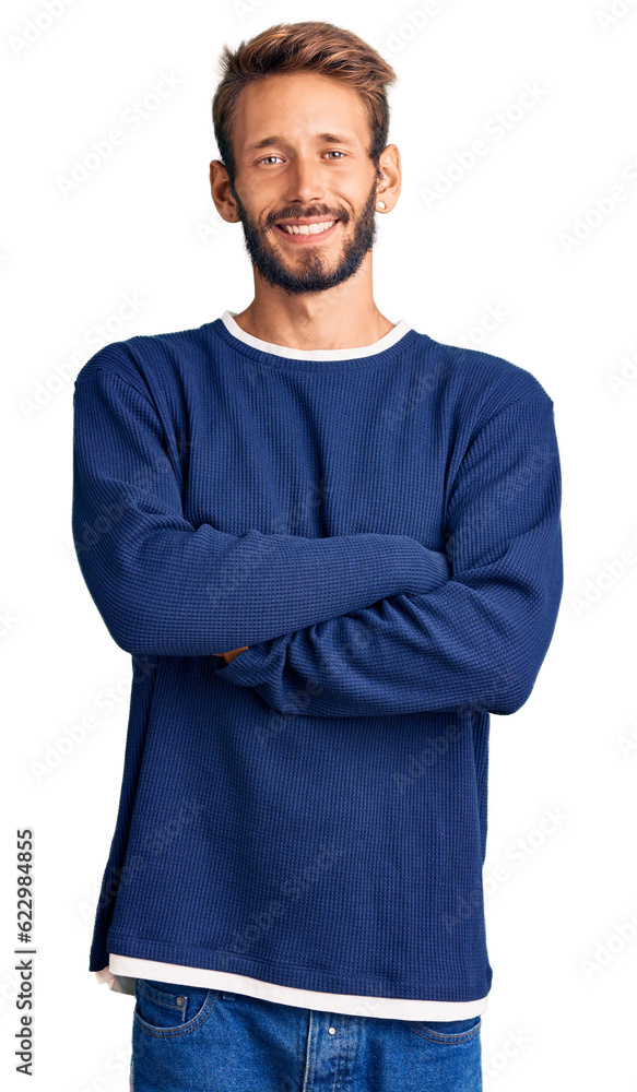 Handsome blond man with beard wearing casual sweater happy face smiling with crossed arms looking at the camera. positive person. Handsome blond man with beard wearing casual sweater happy face smiling with crossed arms looking at the camera. positive person.