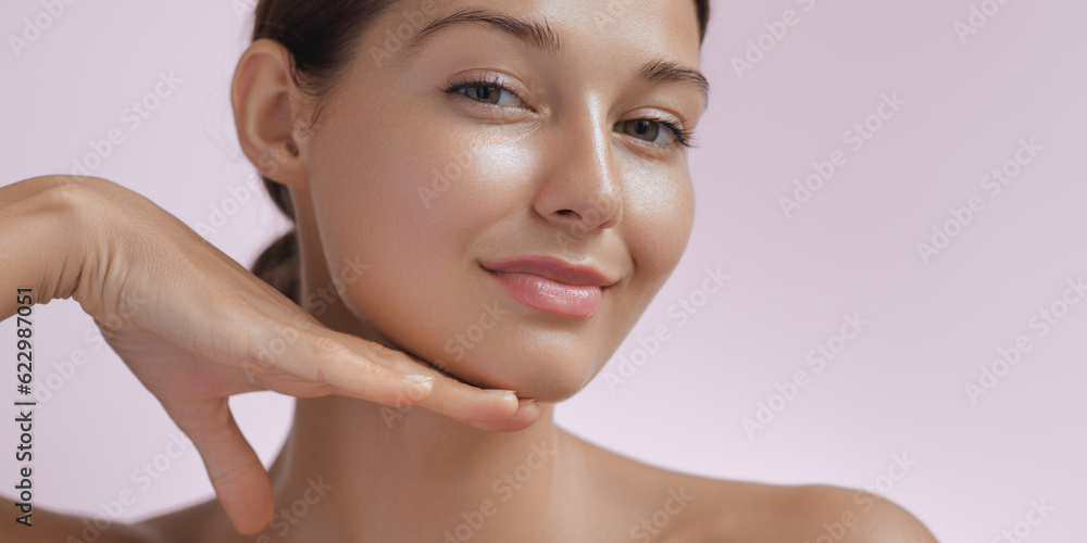 Beauty Photo of Woman with Clean and Healthy Skin Touching Her Face - obrazy, fototapety, plakaty 